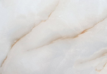 Patterns in the form of a star from marble of different colors, pink pattern on a light background, gray-white marble