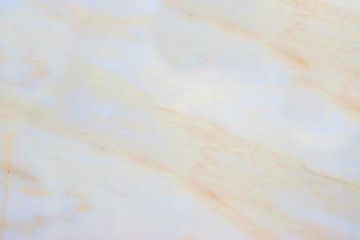 Patterns in the form of a star from marble of different colors, pink pattern on a light background, gray-white marble