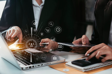   Business using a computer keyboard at office on digital interface. innovation, icon and media information on network connection.