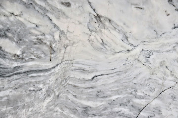 Obraz premium patterns on marble, dark pattern on a light background, gray-white pattern