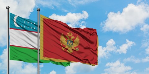 Uzbekistan and Montenegro flag waving in the wind against white cloudy blue sky together. Diplomacy concept, international relations.