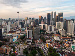 Aerial view of Kuala Lumpur downtown district at sunset in Malaysia capital city in Southeast Asia