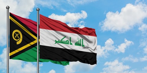 Vanuatu and Iraq flag waving in the wind against white cloudy blue sky together. Diplomacy concept, international relations.