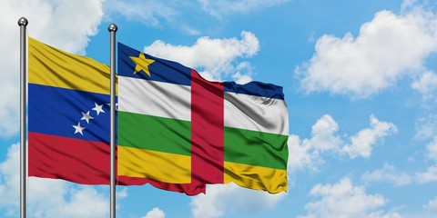 Venezuela and Central African Republic flag waving in the wind against white cloudy blue sky together. Diplomacy concept, international relations.