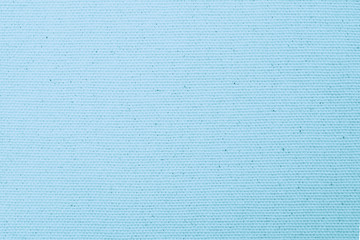 Hessian sackcloth woven texture pattern background in bleached light blue pastel color