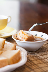 Streamed bread with Thai tea custard