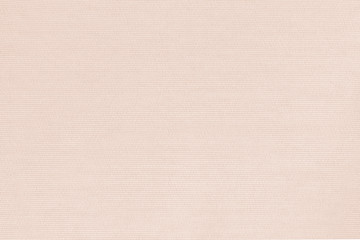 Woven cotton linen fabrics textile textured background in light pink orange beige color