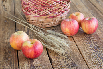Apples close-up over the wooden natural background
