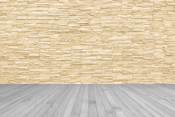 Limestone rock tile wall backdrop in yellow cream brown color tone with wooden floor in dark grey