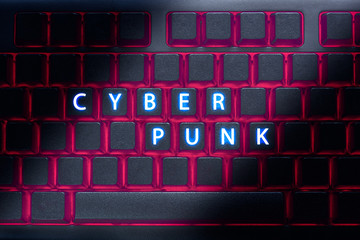 Text "cyber punk" on the keyboard with neon glow