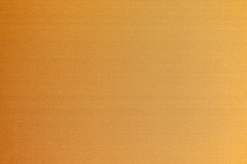Cotton silk fabric wallpaper texture pattern background in yellow orange copper gold brass brown color tone