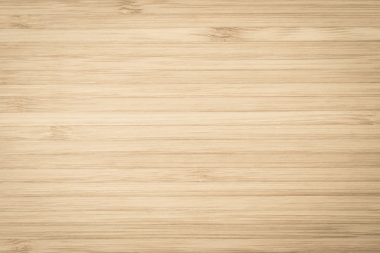 Bamboo wood texture background in natural light yellow brown color .