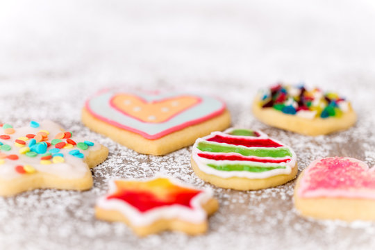 Colorful cookies with dekoration on icing sugar, sweet greeting card