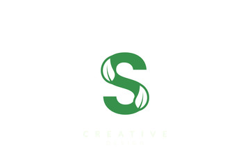 The combination of leaves and letters of the alphabet. Minimalist and simple design in green