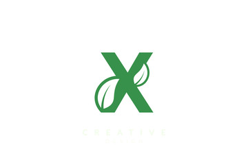 The combination of leaves and letters of the alphabet. Minimalist and simple design in green