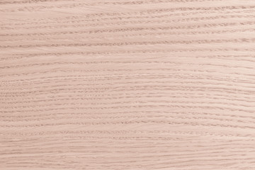 Wooden textured grainy detail backdrop in natural light red oak brown color