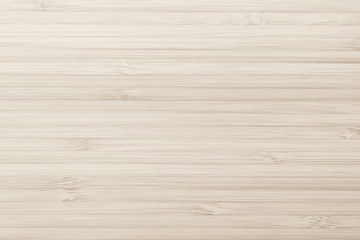 Bamboo wood texture background in cream tan sepia brown.