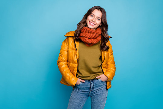 Photo of amazing millennial lady easy-going person holding hands pockets wear modern stylish autumn windbreaker jeans scarf isolated blue color background