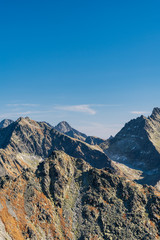 Fototapeta na wymiar Strbsky stit, Ladovy stit, Rysy, Lomnicky stit and Tazky stit mountain peaks in Vysoke Tatry mountains in Slovakia