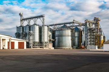 agro-processing and manufacturing plant for processing and silver silos for drying cleaning and storage of agricultural products, flour, cereals and grain. Granary elevator © hiv360