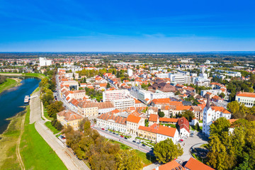 Fototapeta na wymiar Croatia, town of Sisak, aerial view from drone of the old town center and Kupa river