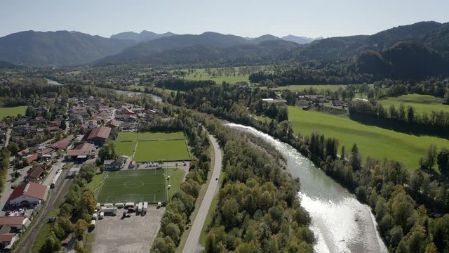 4k Aerial Isar Fluss. Lenggries Brauneck Alpenvorland Bayern Deutschland. Fussballplatz