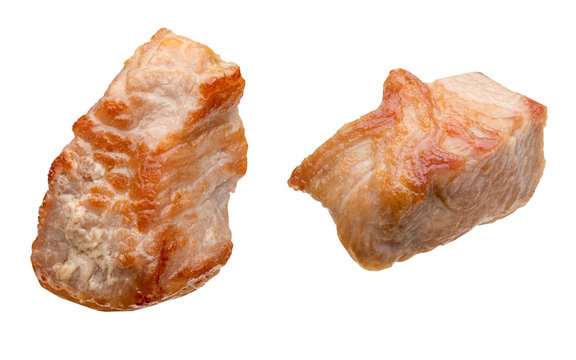 Pieces (in the form of dice) of cooked turkey (chicken) (grilled). Isolated on white background.