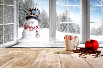 Wooden desk of free space and winter window sill