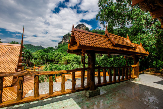 Atmosphere background (Wat Tham Khao Wong - Uthai Thani), landscaping, ancient Thai style houses for tourists to visit, take public photos and make merit while traveling in Thailand.