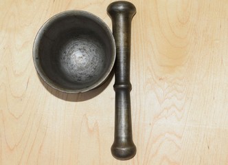 old metal mortar and pestle