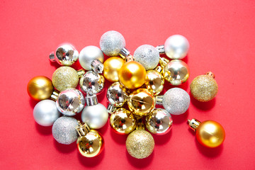 Colorful christmas balls collection on red background