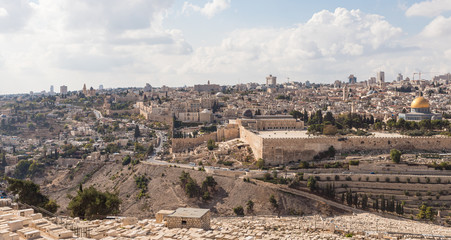 Fototapeta na wymiar Panoramic view of the Jewish cemetery, the Temple Mount, the old and modern city of Jerusalem from Mount Eleon - Mount of Olives in East Jerusalem in Israel