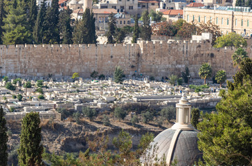 View of the city wall, the old and modern city of Jerusalem from Mount Eleon - Mount of Olives in East Jerusalem in Israel