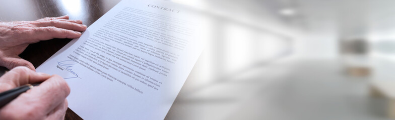 Obraz premium Signing of a contract; panoramic banner