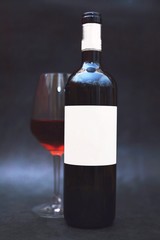 bottle and glass of red wine