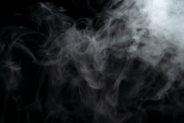 Abstract powder or smoke effect isolated on black background