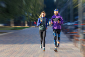 Concept image of fast running couple on the street