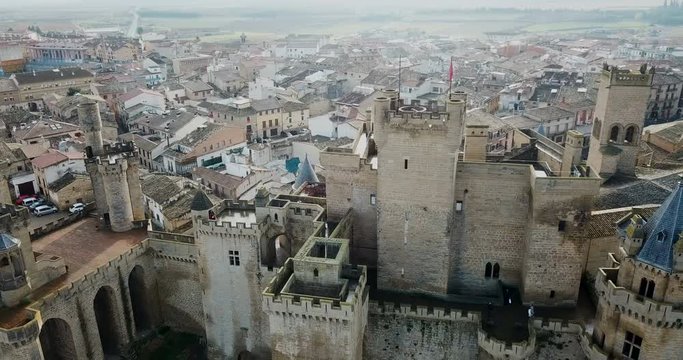 Aerial view of impressive medieval Royal Palace of Olite in autumn day, Navarre, Spain