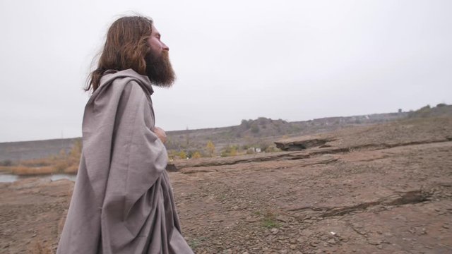Jesus walking along the road