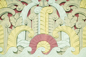 Art Deco tropical pattern with stylized palm trees and waves in pastel colors from the 1930s in tropical sunshine in Miami Beach, Florida, USA