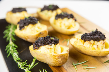 baked potato filled with olive and cream cheese