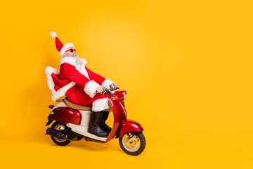 Full body photo of santa white hair grandpa riding speed x-mas party by bike afraid to be late wear...