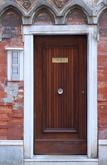 Fototapeta na wymiar Door on brickwall facade