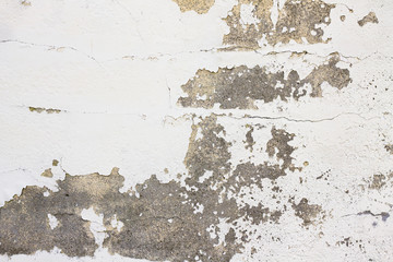 Texture peinture blanche écaillée sur mur de ciment gris