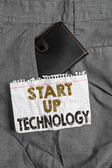 Writing note showing Start Up Technology. Business concept for Young Technical Company initially...