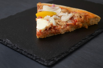pizza slice with tuna and onion, pepperoni, egg, and frankfurter, served 