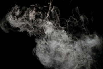 Abstract powder or smoke isolated on black background