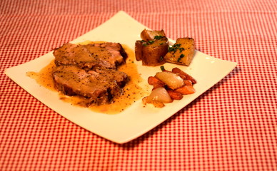 Grilled Steak Ribeye with french fries,Slicing tasty grilled meat with vegetable