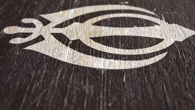 Khanda - Sikh Symbol On Wodden Texture. Ideal For Your Sikh / Religion Related Projects. High Quality Seamless Animation. 1080p, 60fps
