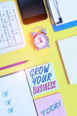 Writing note showing Grow Your Business. Business concept for Achieve higher profit Provide better...